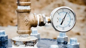 Pressure gauge untuk mengukur tekanan air pada sistem perpipaan gedung